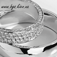 Весільні обручки з діамантами із білого золота