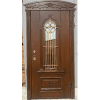 Дубові двері з різьбою
