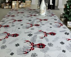 Новорічна скатертина 150х220 в асортименті Новорічна скатертина 150х220 в асортименті