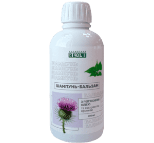 Шампунь-бальзам з реп'яховою олією та екстрактом кропиви по 200 мл у флаконі Шампунь-бальзам з реп'яховою олією та екстрактом кропиви по 200 мл у флаконі